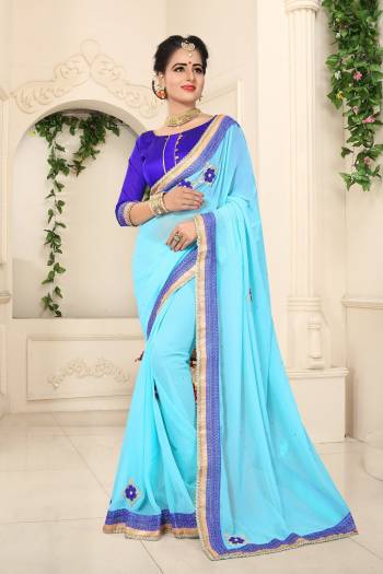 Here Is A Very Pretty Aqua Blue Colored Saree Paired With Blue Colored Blouse. This Saree Is Fabricated On Georgette Paired With Art Silk Fabricated Blouse. This Saree Will Earn You Lots Of Compliments From Onlookers. Buy This Saree Now.