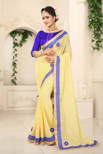 Grab This Beautiful Saree In Pastel Yellow Color Paired With Contrasting Violet Colored Blouse. This Saree Is Fabricated On Georgette Paired With Art Silk Fabricated Blouse. This Saree Is Light Weight And Easy To Carry All Day Long.