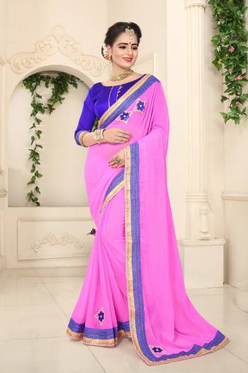 New And Unique Shade Is Here In Pink With This Powder Pink Colored Saree Paired With Contrasting Violet Colored Blouse. This Saree Is Fabricated On Georgette Paired With Art Silk Fabricated Blouse. It Is Light Weight And Easy To Carry All Day Long.