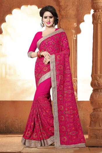 Get The Festive Vibe!! This Beautiful Dark Pink Saree Is Graced With A Stone And Kashmiri Work And  Lace Border Enticed Upon GeorgetteMaking It A Special Edition To Your Wardrobe . Buy This Lovely Saree Now. 