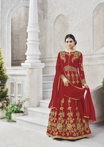 This red suit set featuring floral embroidered and stone work on all over the top is especially designed for women who love ethnic wear. Fashioned from art silk fabric, this set will ensure a comfy fit. Just team this set with high heels.