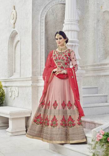 Embodying a perfect blend of traditional and contemporary elegance, this light Pink semi-stitched salwar suit is finished with a floral embroidered on the Yoke. Fashioned from art silk fabric, This attractive suit is the flavour of the season and will give you a classy look. Complement this set with heels.