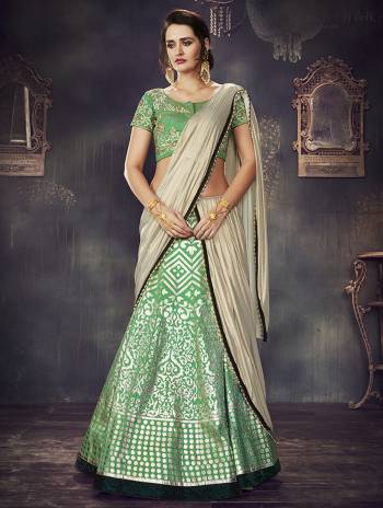 Add an additional element of elegant freshness to your wedding look in this vibrant green lehenga-saree and look sensational. 