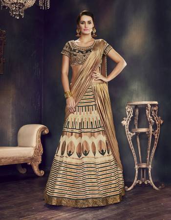 Be a cocktail mix of quirky , classy and stylish at the same time in this black, gold and cream lehenga saree . Go for bold jewelry piece to look striking. 