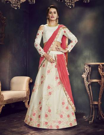 Team this white lehenga adorned with floral weaves and embroideries along with traditional meenakari jewels as look fresh as dew on your special day. 