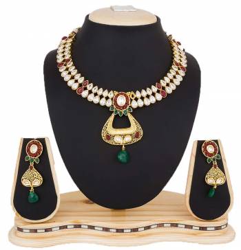 New And Unique Patterned Designer Necklace Set Is Here In Golden Color Which Is Beautified With Multi Colored Stones. This Lovely Necklace Has Multi Layers Making Its Design More Attractive.