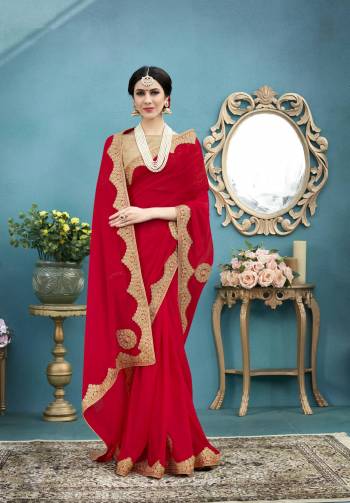 Adorn The Angelic Look Wearing This Lovely Red Colored Saree Paired With Beige Colored Blouse. This Saree Is Fabricated On Georgette Paired With Art Silk Fabricated Blouse. This Saree Is Beautified With Attractive Embroidered Border. It Is Light Weight And Easy To Carry All Day Long.