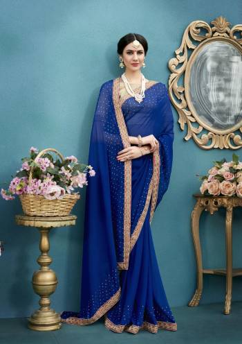 Grab This Pretty Saree In Royal Blue Color Paired With Beige Colored Blouse. This Saree Is Fabricated On Georgette Paired With Art Silk Fabricated Blouse. It Is Light Weight And Easy To Carry All Day Long.