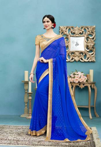 Shine Bright Wearing This Saree In Royal Blue Color Paired With Beige Colored Blouse. This Saree Is Fabricated On Georgette Paired With Art Silk Fabricated Blouse. It Is Easy To Drape And Also Light In Weight Which Is Easy To Carry All Day Long.