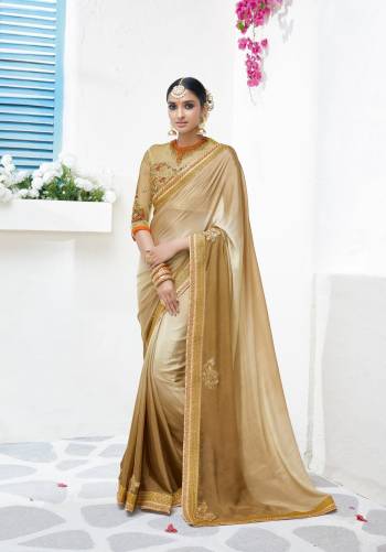 Flaunt Your Rich And Elegant Taste Wearing This Saree In Beige And Cream Color Paired With Beige Colored Blouse. This Saree Is Fabricated Silk Chiffon Paired With Art Silk And Net Fabricated Blouse. This Designer Has Beautiful Color Combination And Heavy Embroidery. 