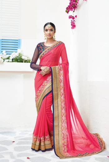 Look Pretty Wearing This Dark Pink Colored Saree Paired With Contrasting Navy Blue Colored Blouse. This Saree Is Fabricated On Georgette Paired With Paired With Art Silk And Net Fabricated Blouse. Its Attractive Colors And Embroidery Will Earn You Lots Of Compliments From Onlookers.