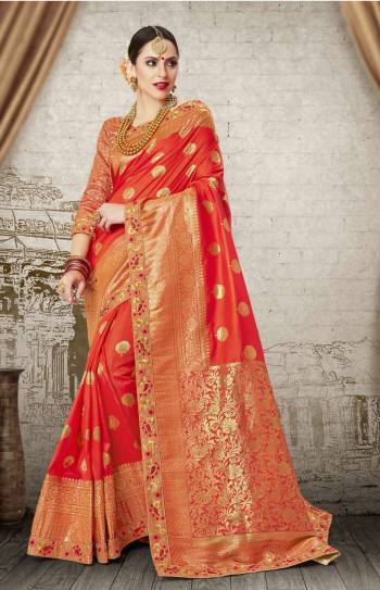 Bright And Visually Appealing Saree Is Here In Orange Color Paired With Orange Colored Blouse. This Saree And Blouse Are Fabricated On Banarasi Art Silk Beautified With Weave And Embroidered Border. This Saree Is Easy To Drape And Carry All Day Long.