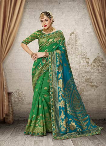 Attract All Wearing This Saree In Green Color Paired With Green colored Blouse. This Saree And Blouse Are Fabricated On Banarasi Art silk Beautified With Weave All Over It And Embroidered Border. This Saree Will Give A Fresh Look Whenever You Wear It.