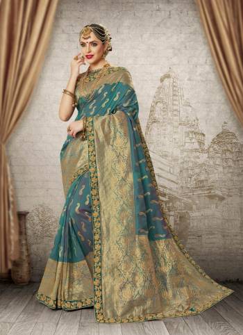 Look Pretty Wearing This Elegant And Subtle Shade Saree In Blue Color Paired With Blue Colored Blouse. This Saree And Blouse Are Fabricated On Banarasi Art Silk Beautified With Weave All Over The Saree And Embroidered Lace Border.