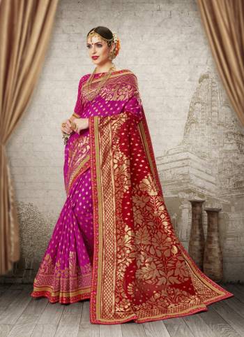 Celebrate This Festive Season Wearing This Attractive Saree In Dark Pink And Red Color Paired With Dark Pink Colored Blouse. This Saree And Blouse Are Fabricated On Banarasi Art Silk Beautified With Weave All Over The Saree. Buy This Saree Now.