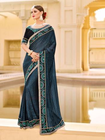 you Look striking and stunning afler wearing this Navy Blue color brasso saree. look gorgeous at an upcoming any occasion wearing the saree. this party wear saree won't fail to impress everyone around you. Its attractive color and designer patch, stone, mirror, floral design work over the attire & contrast hemline adds to the look. Comes along with a contrast unstitched blouse.