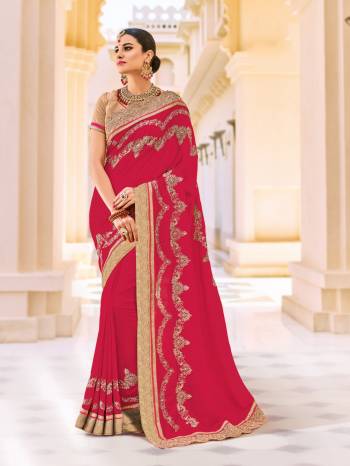 Drape this dark pink color silk fabric saree. this gorgeous saree featuring a beautiful mix of designs. look gorgeous at an upcoming any occasion wearing the saree. Its attractive color and designer patch, moti, floral design work over the attire & contrast hemline adds to the look. Comes along with a contrast unstitched blouse.