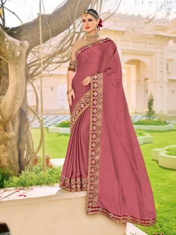 Flaunt your gorgeous look wearing this dusty pink color two-tone moss chiffon saree. Ideal for party, festive & social gatherings. this gorgeous saree featuring a beautiful mix of designs. Its attractive color and designer patch, stone, floral design work over the attire & contrast hemline adds to the look. Comes along with a contrast unstitched blouse.