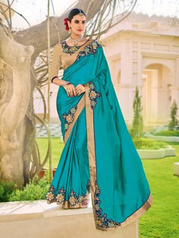 The fabulous pattern makes this saree from Indian Women a classy number to be included in your wardrobe. Blue color two-tone silk fabrics saree. Ideal for party, festive & social gatherings. this gorgeous saree featuring a beautiful mix of designs. Its attractive color and designer patch, moti, stone, floral design work over the attire & contrast hemline adds to the look. Comes along with a contrast unstitched blouse.