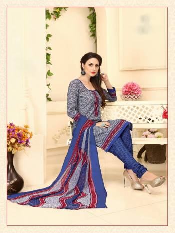 If You Are Working Lady Than Grab This Dress Material In Grey Color Paired With Blue Colored bottom and Multi Colored Dupatta. Its Top And Bottom Are Fabricated On Cotton Paired With Chiffon Dupatta. Get This Stitched As Per Your Desired Fit And Comfort.