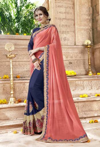 Most Demanding Color Of The Season Is Here Wearing This Saree In Peach And Navy Blue Color Paired With Navy Blue Colored Blouse. This Saree Is Fabricated On Chiffon And Georgette Paired With Art Silk Fabricated Blouse. This Saree Is Suitable For All Occasion Wear.