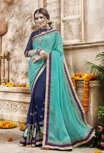 Celebrate This Festive Season Wearing This Saree In Sea Green And Navy Blue Color Paired With Navy Blue Colored Blouse. This Saree Is Fabricated On Chiffon And Georgette With Embroidery All Over.