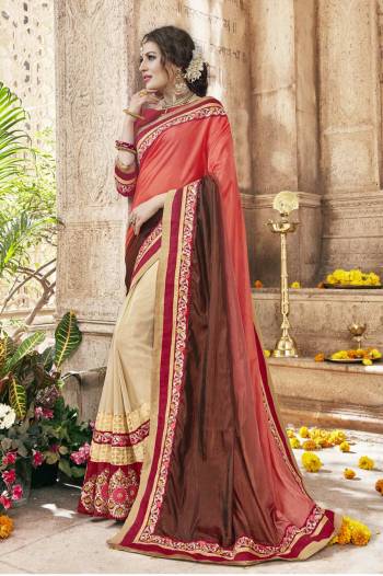 Get Ready For The Next Festive Season With This Saree In Orange And Beige color paired With Contrasting Red Colored Blouse. This Saree Is Fabricated On Silk And Georgette Paired With Art Silk Fabricated Blouse. 