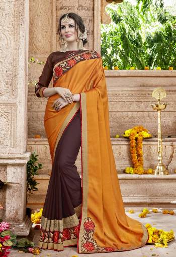 For Your Festive Wear Or Any Function At Your Place, Grab This Designer Saree In Musturd Yellow And Brown Colored Saree Paired With Brown Colored Blouse. This Saree Is Fabricated On Satin And Georgette Paired With Art Silk Fabricated Blouse. It Is Beautified With Resham Embroidery And Stone Work.