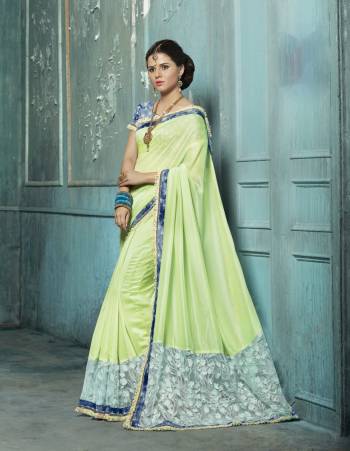 Look Pretty In This Designer Saree In Pastel Gren Color Paired With Contrasting Blue Colored Blouse. This Saree Is Fabricated On Silk Chiffon And Net Paired With Art Silk Fabricated Blouse. Its Light Weight Fabric And Design Ensures Superb Comfort All Day Long.