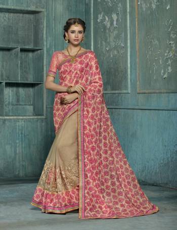 Flaunt Your Rich And Elegant Taste Wearing This Saree In Pink And Beige Color Paired With Pink Colored Blouse. This Saree Is Fabricated On Chiffon And Net Paired With Art Silk Fabricated Blouse. Its Has Floral Prints And Embroidery Over The Saree Panel.