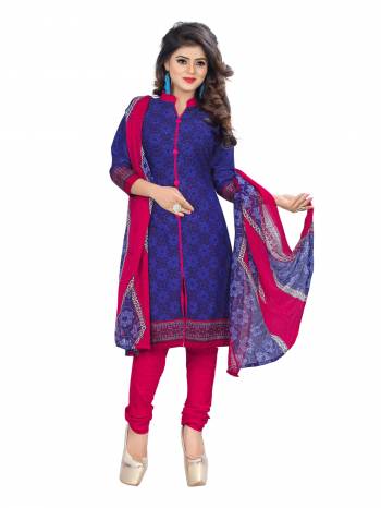 Grab This Violet Colored Dress Material Paired With Contrasting Dark Pink Colored Bottom And Dupatta. Its Top And Bottom Are Fabricated On Cotton Paired With Chiffon Dupatta. This Dress Material Ensures Superb Comfort All Day Long.