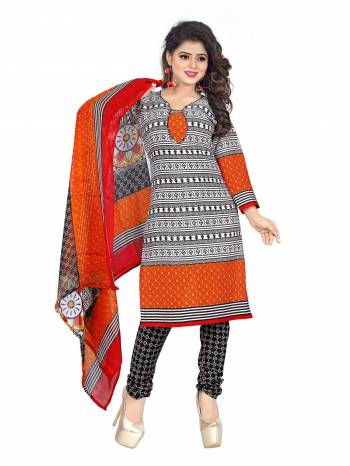 Perfect Suit For Your Casual Wear Is Here In Orange And Black Color Paired With Black Colored Bottom And Orange Colored Dupatta. Its Top And Bottom Are Fabricated On Cotton Paired With Chiffon Dupatta. It Is Beautified With Simple Prints All Over It.