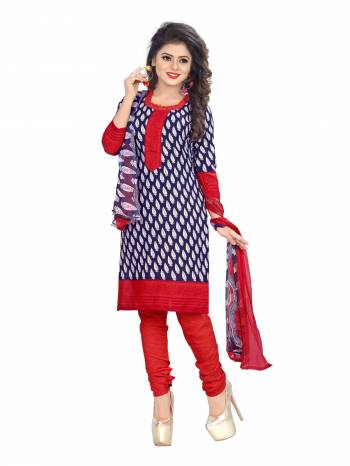 Simple Dress Material Is Here For Your Casual wear In Violet Color Paired With Contrasting Red Colored Blouse. Its Top and Bottom Are Fabricated On Cotton Paired With Chiffon Dupatta. Get This Stitched As Per Your Desired Fit And Comfort.