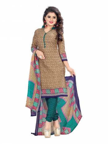 Earn Lots Of Compliments Wearing This Suit In Beige Colored Top Paired With Pine Green Colored Bottom And Multi Colored Dupatta. Its Top And Bottom Are Fabricated On Cotton Paired With Chiffon Dupatta. It Is Beautified With Simple Prints All Over It.