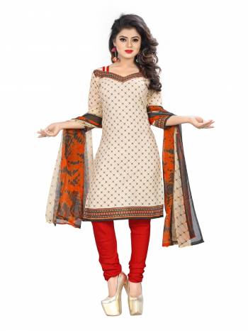 Look Simple And Elegant Wearing This Suit In Cream Colored Top Paired With Red Colored Bottom And Orange Colored Dupatta. This Dress Material Is Fabricated On Cotton Paired With Chiffon Dupatta. Buy Now.