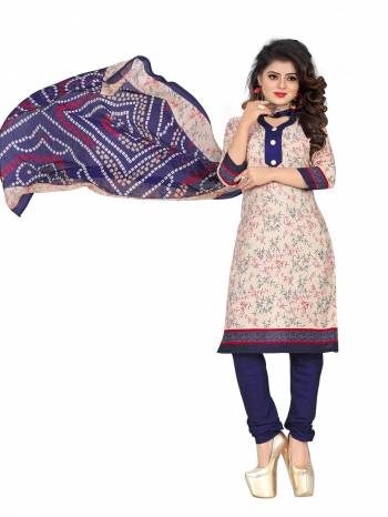 Here Is A Pretty Simple Suit For Your Daily Wear In Off-White Colored Top Paired With Navy Blue Colored Bottom And Dupatta. Its Top and Bottom Are Fabricated On Cotton Paired With Chiffon Dupatta. Get This Dress Material Stitched As Per Your Desired Fit And Comfort.