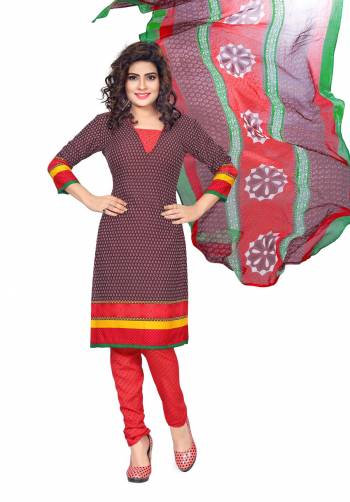 For Your Casual Wear Here Is Simple Dress Material In Wine Color Paired With Contrasting Red Colored Bottom And Multi Colored Dupatta. Its Top and Bottom Are Fabricated On Cotton Paired With Chiffon Dupatta. This Suit Is Light In Weight And Easy To Carry All Day Long.