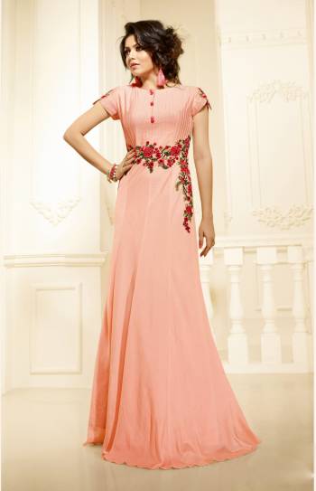 Look Pretty Wearing This Lovely Readytmade Gown In Peach Color Fabricated On Art Silk. It Is Beautified With Thread Embroidered Patch Work. Wear This And You Will Definitely Earn Lots Of Compliments From Onlookers.