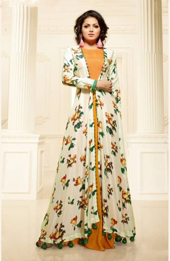 Another Beautiful Designer Gown Is Here In Jacket Pattern In Off-White And Musturd Yellow Color. This Pretty Gown Is Fabricated On Rayon Cotton Beautified With Bold Floral Prints. Buy This Readymade Gown Now.