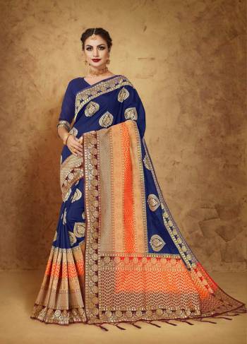 Enhance Your Personality Wearing This Saree In Navy Blue Colored Saree Paired With Navy Blue Colored Blouse. This Saree And Blouse Are Fabricated On Banarasi Art Silk Beautified With Weave All Over It. Buy This Beautiful Designer Saree Now.