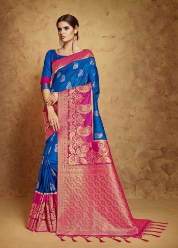 Colors That Are Always In Trend Are Here In This Designer Banarasi Saree. This Saree IS In Blue And Pink Color Paired With Blue Colored Blouse. This Saree And Blouse Are Fabricated On Banarasi Art Silk Beautified With Weave All Over It. It Is Soft Towards Skin and Easy To Carry All Day Long.