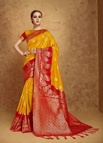 Yellow Color Induces Perfect Summery Appeal To Any Outfit So Grab This Banarasi Saree In Musturd Yellow And Red Color Paired With Musturd Yellow Colored Blouse. This Saree And Blouse Are Fabricated On Banarasi Art Silk. This Saree Will definitely Give You A Rich Look.