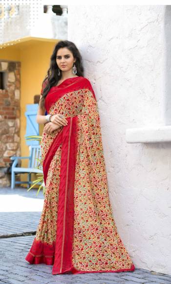 Grab This Pretty Printed Saree In Cream And Red Color Paired With Red Colored Blouse. This Saree Is Fabricated On Georgette Paired With Satin Fabricated Blouse. It Is Beautified With Intricate Prints All Over It.