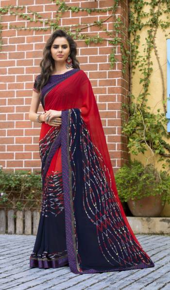 Trendy Saree Is Here With This Saree In Red And Navy Blue Color Paired With Navy Blue Colored Blouse. This Saree Is Fabricated On Georgette Paired With Satin Fabricated Blouse. It Is Easy To drape And Durable Fabric.