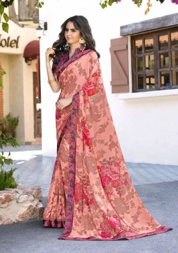 Look Pretty In This Peach Colored Saree Paired With Black Colored Blouse. This Saree Is Fabricated On Georgette Paired With Satin Fabricated Blouse. It Is Beautified With Bold Floral Prints Making The Saree Attractive.