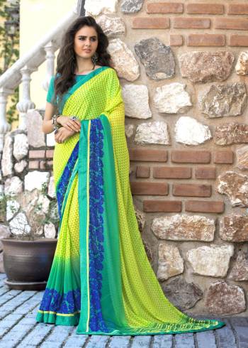 Attract All Wearing This Saree In Yellow And Green Color Paired With Contrasting Teal Green Colored Blouse. This Saree Is fabricated On Georgette Paired With Satin Fabricated Blouse. It Is Beautified With Intricate Prints All Over It.