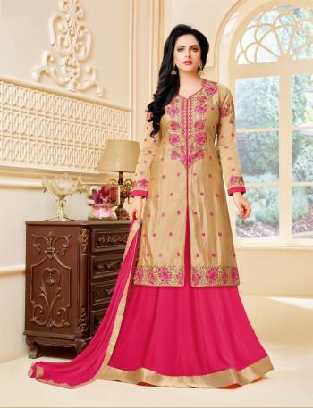 Simple And elegant Looking Indo-Western Suit Is Here Beige Colored Top Paired With Pink Colored Lehenga And Dupatta. Its Top Is Fabricated On Art Silk Paired With Georgette Fabricated Skirt And Chiffon Dupatta. Its Top Is Beautified With Resham Embroidery All Over It.