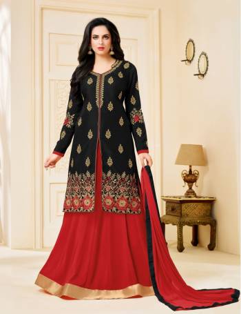 Enhance Your Personality Wearing This Indo-Western Suit In Black Colored Top Paired With Red Colored Lehenga And Dupatta. Its Top Is Fabricated On Art Silk Paired With Georgette Lehenga And Chiffon Dupatta. Its Royal Combination And Pattern Will Make You Earn Lots Of Compliments From Onlookers.