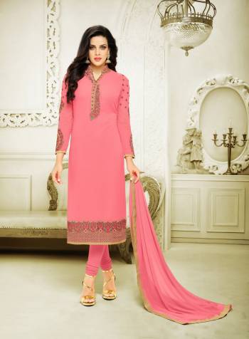 Look Pretty Wearing This Straight Cut Suit In Pink Color Paired With Pink Colored Bottom And Dupatta. Its Top Is Fabricated On Georgette Paired With Santoon Bottom And Chiffon Dupatta. Its Top Is Beutified With Multi Colored Embroidery. Buy This Designer Suit Now.