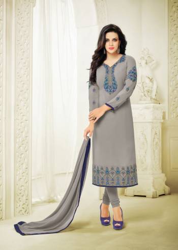 Flaunt Your Rich and Elegant Taste With This Straight Cut Suit In Grey Color Paired With Grey Colored Bottom And Dupatta. Its Top Is Fabricated On Georgette Paired With Santoon Bottom And Chiffon Dupatta. Get This Stitched As Per Your Desired Fit And Comfort.